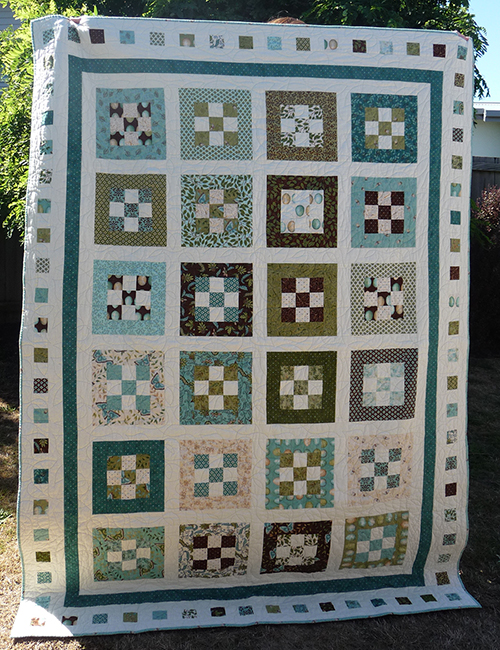 ‘Sweet Menagerie’ Nine-Patch Quilt